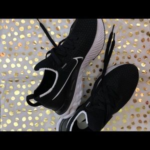 Nike black and white flyknit infinity shoes